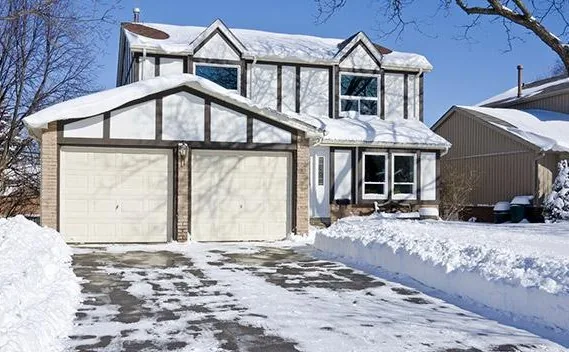 Residential driveway cleared after snow removal