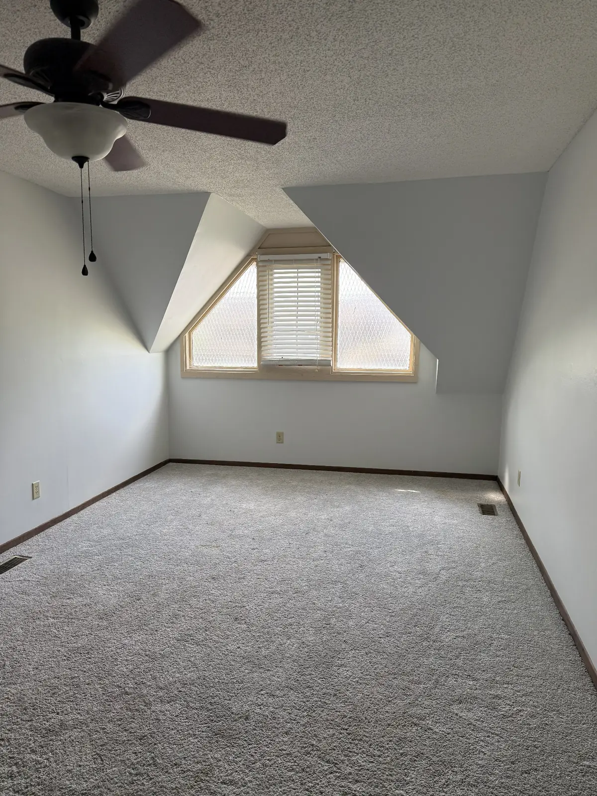 Interior room after walls and trim were freshly painted